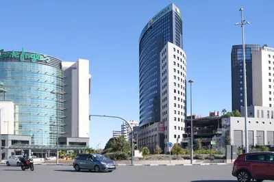 a city with tall buildings and cars on a street at Suite near to Marathon - City of Arts & Sciences in Valencia