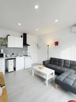 a living room with a couch and a table at Apartment Ruzafa Market 9B in Valencia