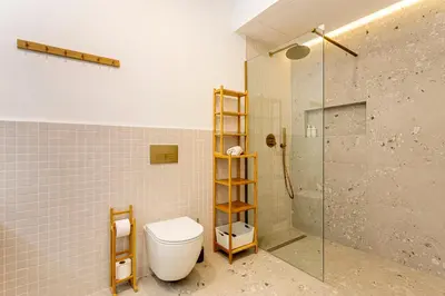 a bathroom with a toilet and a shower at C - Design apartment El Grao close to the beach in Valencia