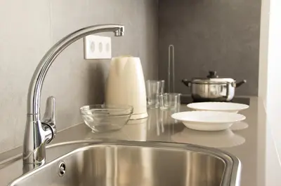 a kitchen counter with a sink and a mixer at Soho Valencia in Valencia