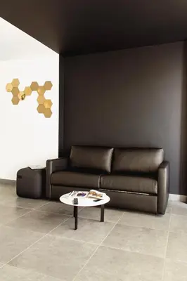 a living room with a couch and a coffee table at Soho Valencia in Valencia