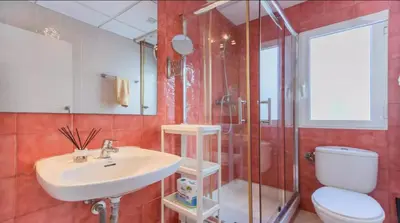 a bathroom with a sink and a shower and a toilet at Tu Estudio En El Centro-Ruzafa 10C in Valencia