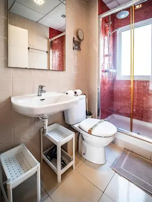 a bathroom with a toilet and a sink and a shower at Estudio En El Centro-Ruzafa 10D in Valencia