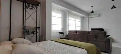 a bedroom with a bed and a large window at Apartamento En La Ciudad De Las Artes y Las Ciencias in Valencia