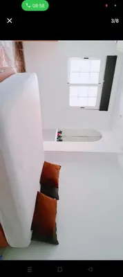 a view of a room with a window and a couch at Piso in Valencia