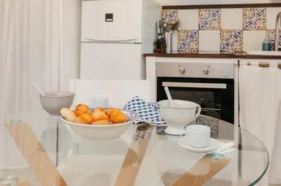 a glass table with a bowl of bread on it at Brisas Chulilla Mirador House in Chulilla