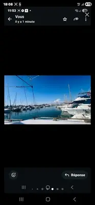 a television screen with a picture of a marina at La Pepa in Valencia