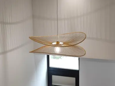 a ceiling light in a room with a window at Loft acogedor junto al Roig Arena in Valencia