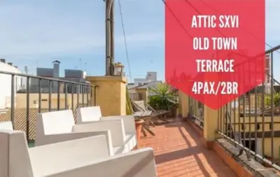a balcony with white chairs and a red sign at Gran Ático Premium del Siglo XVI con Tres Terrazas Privadas Hasta 7 Huéspedes en Ciutat Vella in Valencia