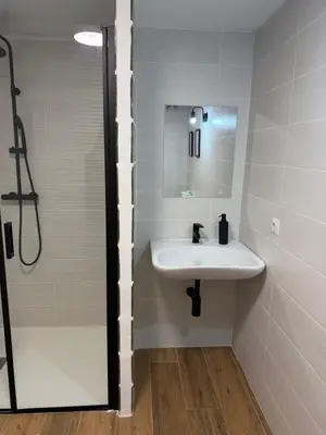 a bathroom with a sink and a shower at Apartamento junto a la playa in Valencia