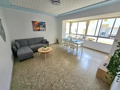 a living room with a couch and a table at Simat Malina in Simat de Valldigna