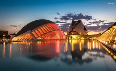 a view of a building with its lights on at Apartment near the beach and the City of Sciences in Valencia