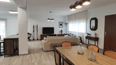 a living room with a couch and a table at Casa Principal Finca Mas el Bravo in Caudiel