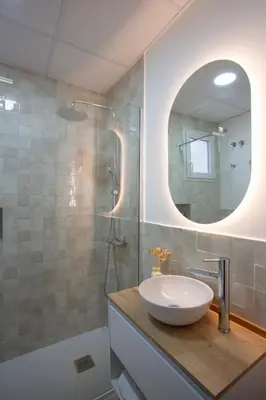 a bathroom with a sink and a mirror at Casa La Pedrera in Pedralba