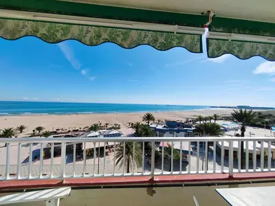 a balcony with a view of the beach at Vistal Mar in Puerto de Sagunto