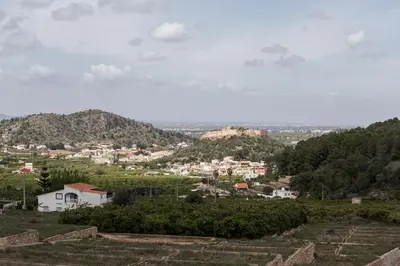 a view of a town from a hill at White House with MINIGOLF 10 minutes from Cullera in Corbera de Alcira