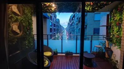 a balcony with a view of a city at Sientete como en casa in Sedaví