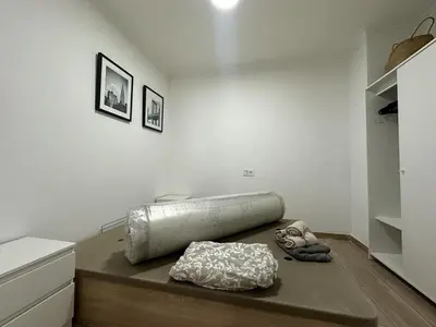a living room with a mattress on the floor at Vivienda junto al Mercado Central in Valencia