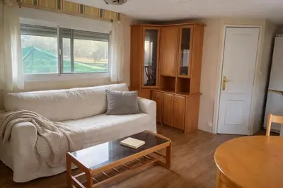 a living room with a couch and a table at A place where nothing is expected in Náquera