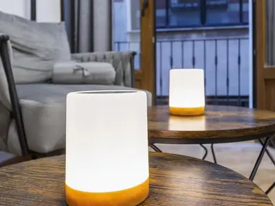 two lights sitting on top of two tables at Winahost Loft Colón in downtown Valencia in Valencia