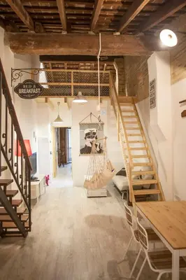 a room with a hammock hanging from the ceiling at Apartment next to the beach in Valencia