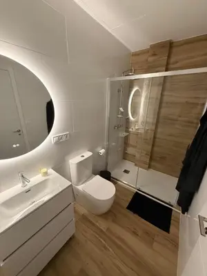a bathroom with a toilet and a sink and a shower at Loft acogedor y luminoso in Valencia