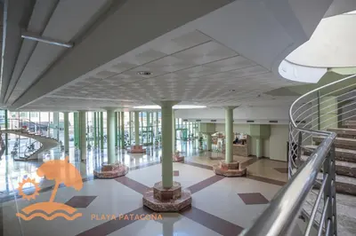 a lobby of a building with columns and stairs at Holiday Mare Nostrum in Valencia