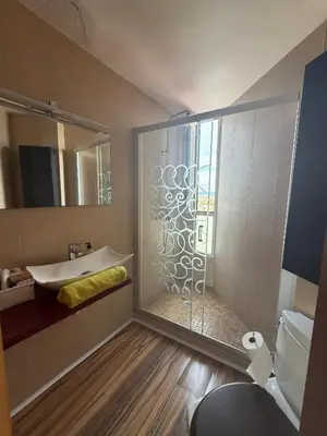 a bathroom with a glass shower and a sink at Malvarrosa Penthouse 4 rooms, suite, terrace and balcony in Valencia