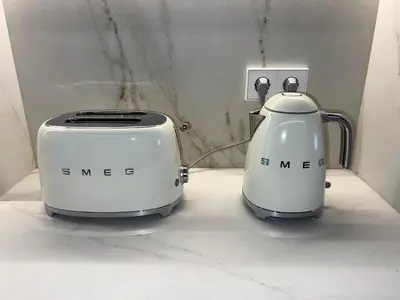 two toasters sitting next to each other on a counter at Bright spacious luxury apartment in Valencia