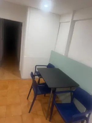 a table and two chairs in a room at Danner in Valencia