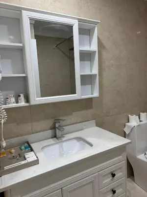 a bedroom with a white bed and a television at air hotel aviacion in Valencia