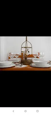 a table with plates and wine glasses on it at Valencia city in Valencia