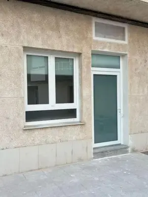 a window and a door on the side of a building at Aqua Vida Apartments Sueca in Sueca