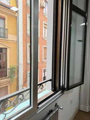 a window with a view of a building at Heart of Valencia in Valencia