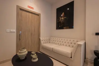 a living room with a white couch and a table at Loft Valencia - B 1-6 Smart Access & Urban Calm in Valencia