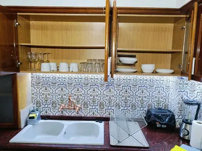 a kitchen with a sink and a counter top at Espectacular estudio en PB con terraza privada in Valencia