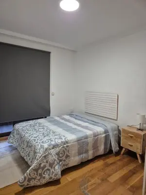 a white refrigerator in a kitchen with a microwave at Habitación doble Valencia in Alaquas