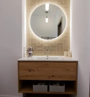 a bathroom with a sink and a mirror at NOMAD Viveros 02 in Valencia
