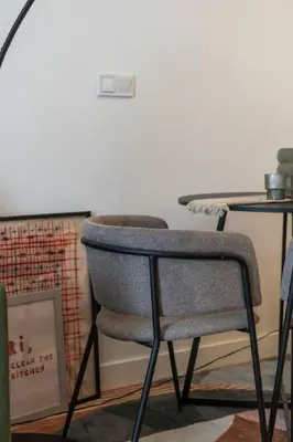 a chair sitting in front of a table at Studio 01 - Les Artes in Valencia