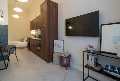 a living room with a flat screen tv on a wall at Studio 02 - Les Artes in Valencia