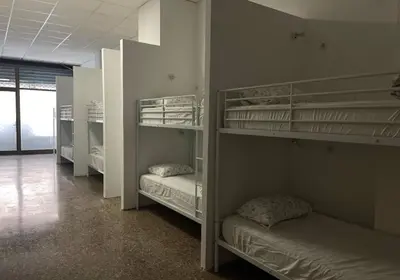 a group of bunk beds in a room at Hostel valencia ruzafa in Valencia