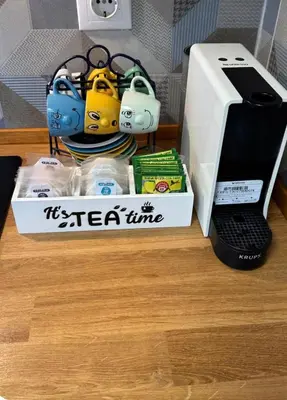 a box on a table next to a printer at Chalet Piscina Privada in Barraca de Aguas Vivas