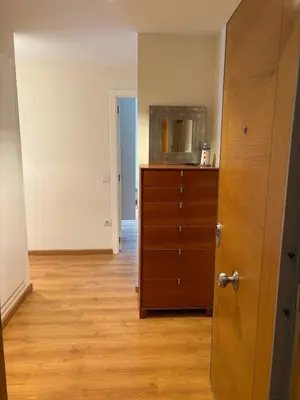 an empty room with a dresser and a mirror at Relaxing Sea View Apartment - Patacona Beach in Valencia