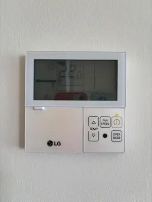 a microwave on a wall in a room at Relaxing Sea View Apartment - Patacona Beach in Valencia