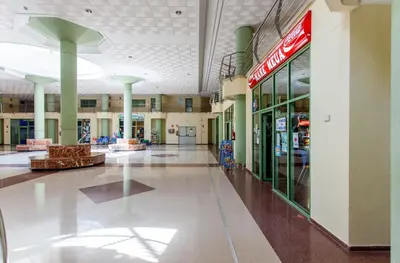 an empty shopping mall with a coca cola store at Apartment Patacona Beach 7 in Valencia
