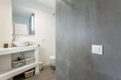 a bathroom with a sink and a toilet at Apartment Ruzafa Puerto Rico in Valencia