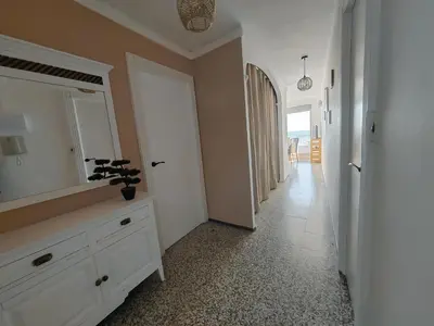 a bathroom with a white dresser and a mirror at Maravillosa vistal'mar in Puerto de Sagunto