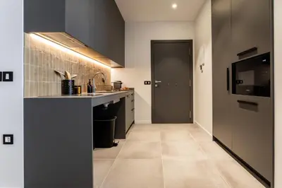 a kitchen with a sink and a counter top at Valencia Home Alfahuir in Valencia