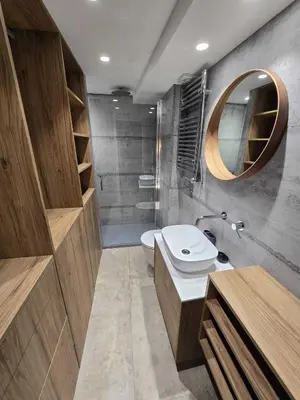 a bathroom with a toilet and a sink and a mirror at Centro Histórico - Beneficencia Flat in Valencia