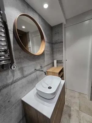 a bathroom with a white sink and a mirror at Centro Histórico - Beneficencia Flat in Valencia